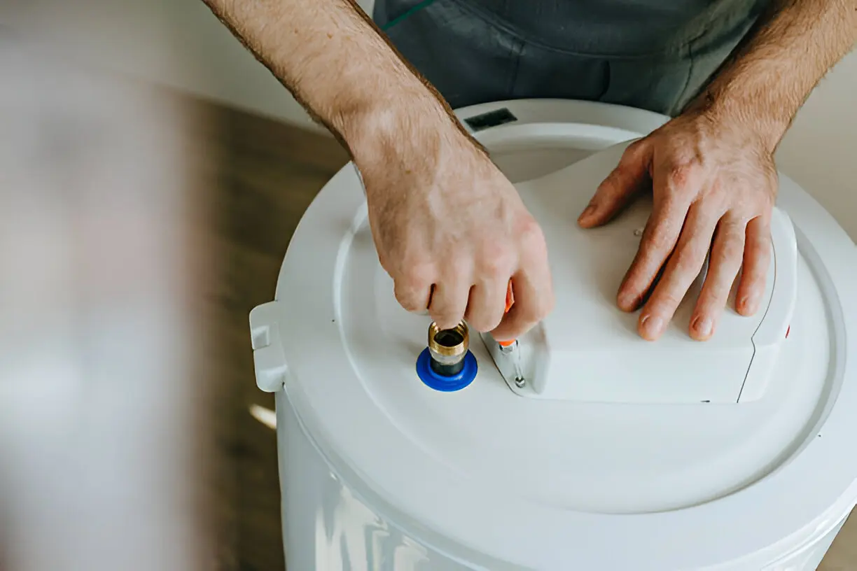Technician servicing a home heating system during winter in Los Angeles
